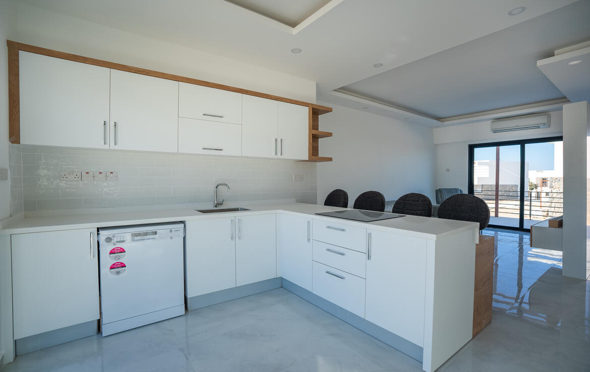 Апартаменты 1+1 с садом в Эсентепе 