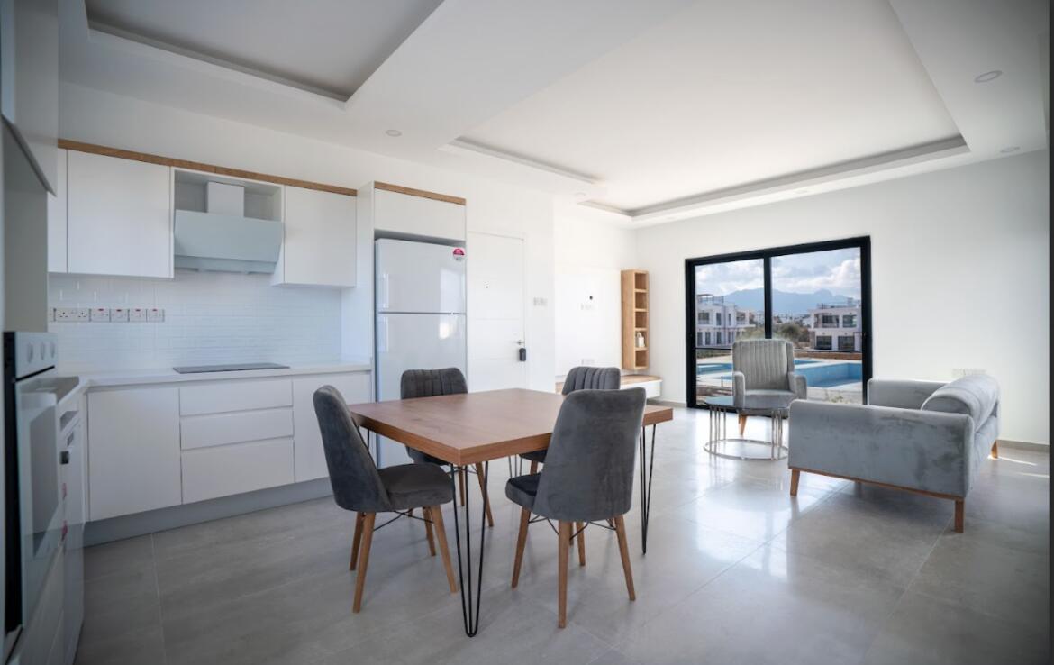 Апартаменты 1+1 с садом в Эсентепе 